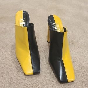 Black & yellow slip-on heels, mules